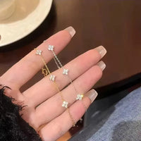 Zirkon fyrbladigt blomsterarmband för kvinnor guld rostfritt stål