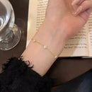 Zirkon fyrbladigt blomsterarmband för kvinnor guld rostfritt stål