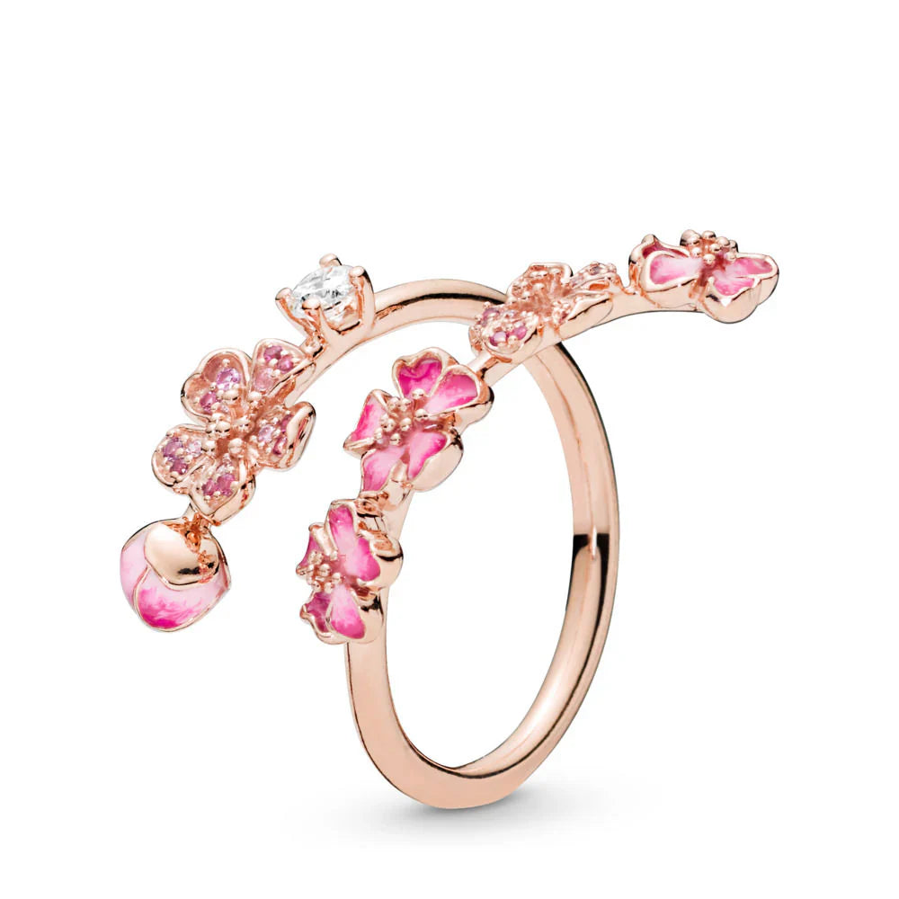 Delikat blommig ring med rosa och vit zirkon