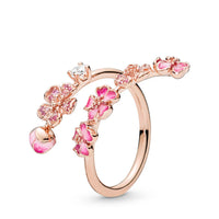 Delikat blommig ring med rosa och vit zirkon